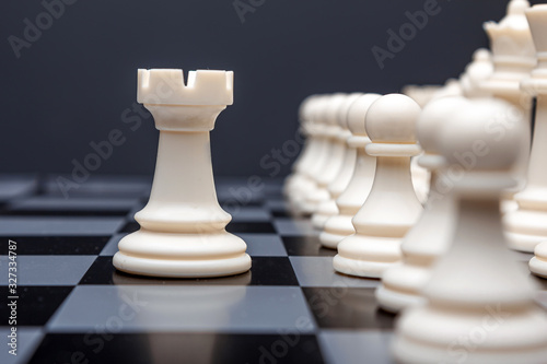 Fotografia Chess pieces, rook on a chessboard, game