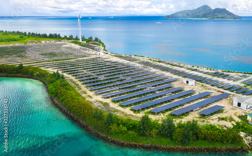 Aerial view on artificial island with solar batteries photo