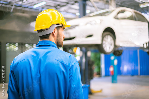 Mechanics in the workshop garage. Auto car services concepts