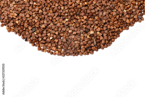 raw buckwheat groats on a white background