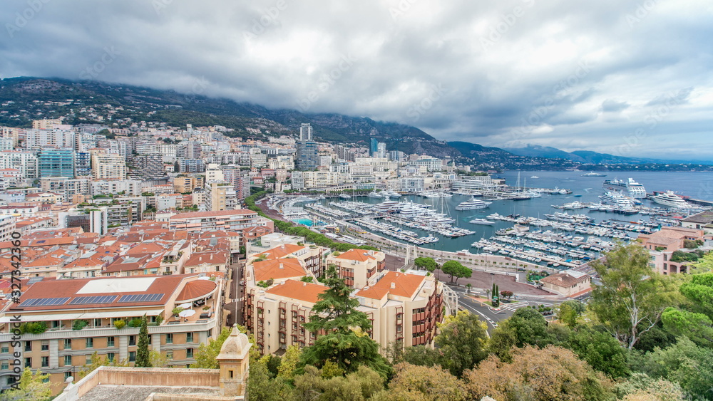 Obraz premium Monte Carlo city aerial panorama timelapse. View of luxury yachts and apartments in harbor of Monaco, Cote d'Azur.