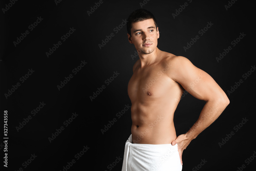 Man with sexy body on black background. Space for text Man with sexy body on black background. Space for text