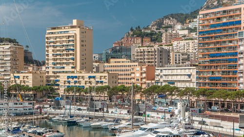 Monte Carlo city aerial panorama timelapse. View of luxury yachts and apartments in harbor of Monaco, Cote d'Azur. © neiezhmakov