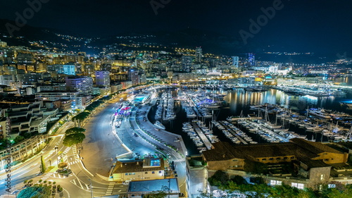 Panorama of Monte Carlo timelapse at night from the observation deck in the village of Monaco with Port Hercules.