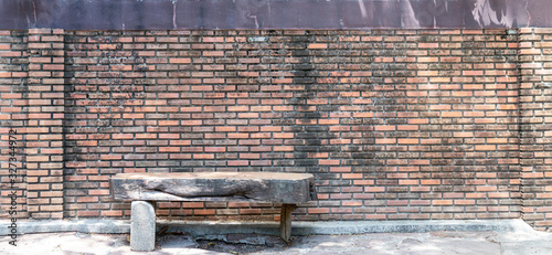 Texture of red brick use for background images, The pattern of bricks with chair made of wood