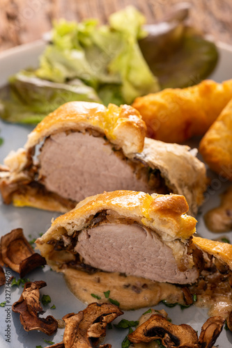 pork filet in puff pastry with croquettes
