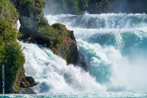 Fototapeta Naklejka Na Ścianę i Meble -  the famous rhine falls in the swiss near the city of Schaffhausen - sunny day and blue sky
