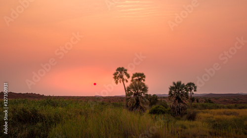 Sunset in Palwag lodge in Damaraland, Namibia photo
