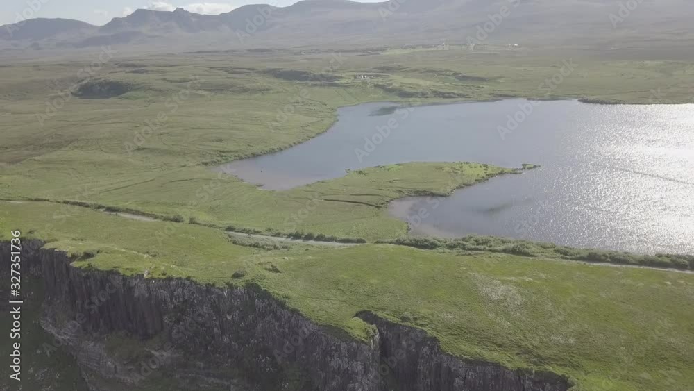Coastal area with green mountains aerial view Coastal area with green mountains aerial view