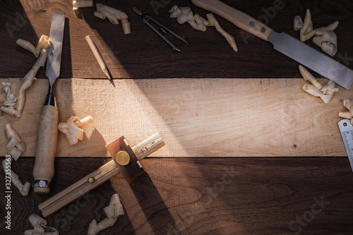 DIY concept. Top view of the woodworking and crafts tools. Carpentry hand tools. Wooden background.