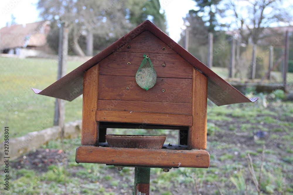 Bird wooden house and sunflower seed ball Bird wooden house and sunflower seed ball