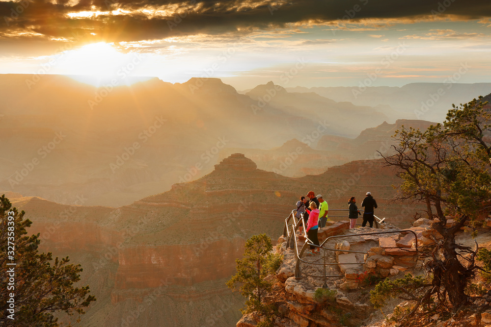 Sunrise at Grand Canyon. Photo Shows a Group of Tourists Watching Sunrise at Mather Point which is famous for Sunrise.