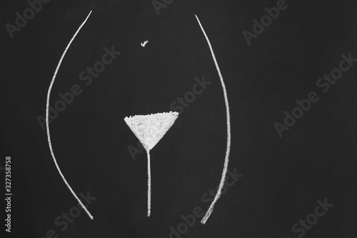 trimmed natural pubic hair style or hairstyle known as american or classic bikini wax or bermuda triangle - simple minimalist line drawing with chalk on blackboard photo