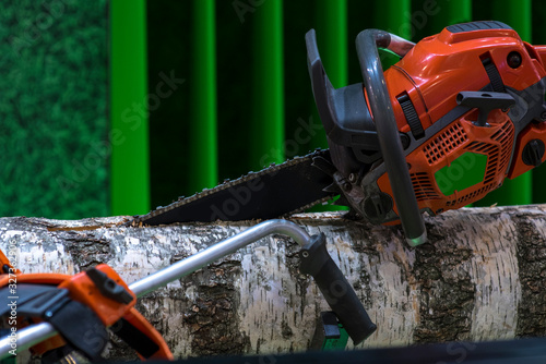 Wallpaper Mural Close-up professional chainsaw blade cutting birch Torontodigital.ca