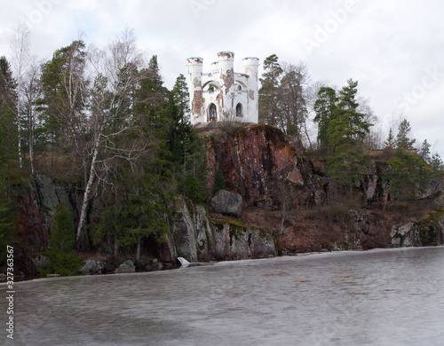 Spring view of the Monrepos Park, Vyborg, Leningrad Region, Russia. Beatiful spring landscape, a castle on a rock.