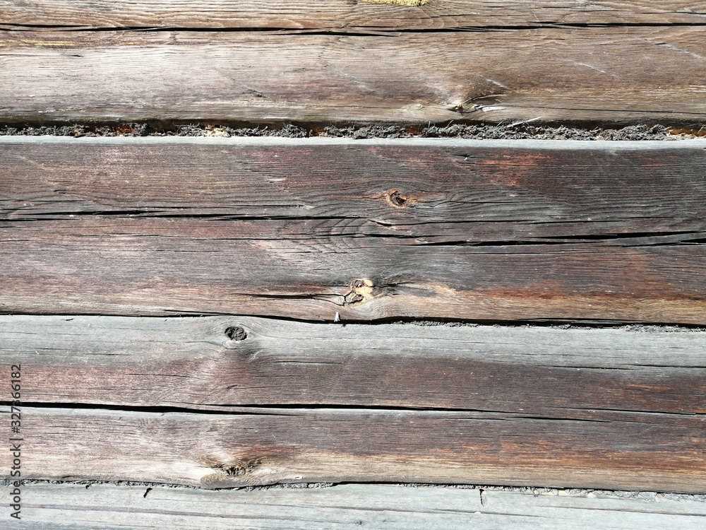 beautiful industrial background and texture of dry weathered horizontal boards of dark color