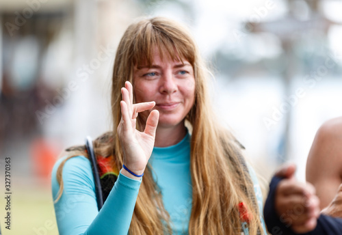 portrait of young girl at a pre-dive briefing, depth of field background blur