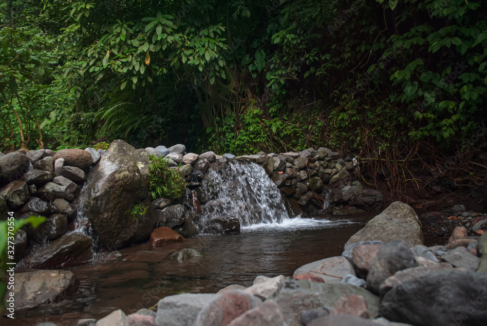 View of river in the rainforest, bogor Indonesia View of river in the rainforest, bogor Indonesia