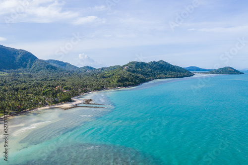 Aerial view of tropical island coastline