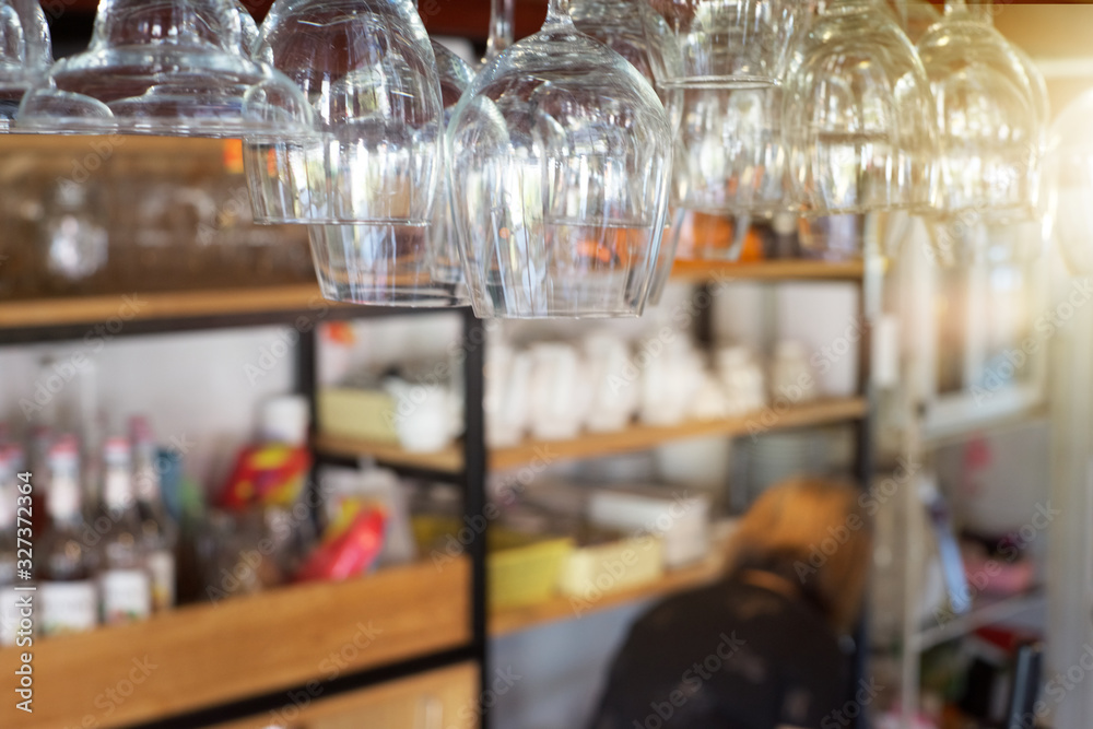 Many wine glasses hang on the counter, restaurant or coffee shop decoration Many wine glasses hang on the counter, restaurant or coffee shop decoration