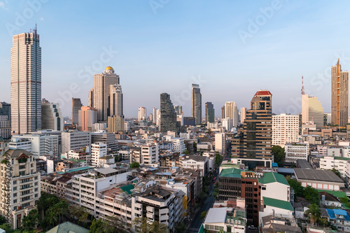 Aerial cityscape of picturesque Bangkok at daytime from rooftop. Panoramic skyline of the biggest city in Thailand. The concept of metropolis.