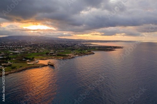 Drone view on ship wreck in Pegeia. Sunrise on Cyprus photo