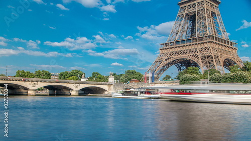 The Eiffel tower timelapse from embankment at the river Seine in Paris