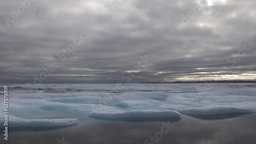 Glacier lagoon and icebergs on Peel Sound, a waterway situated in Prince of Wales island at the Northwest Passage in Canada. photo