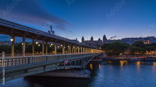 View of pont de Bir-Hakeim day to night timelapse - a bridge that crosses the Seine River. Paris, France © neiezhmakov