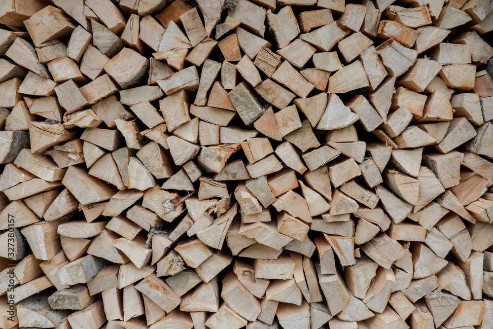 Stacks of Firewood. Preparation of firewood for the winter. Pile of Firewood.Firewood background Stacks of Firewood. Preparation of firewood for the winter. Pile of Firewood.Firewood background
