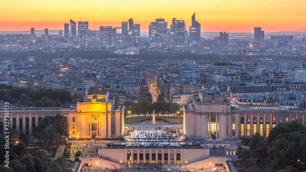 Aerial view over Trocadero day to night timelapse with the Palais de Chaillot seen from the Eiffel Tower in Paris, France.