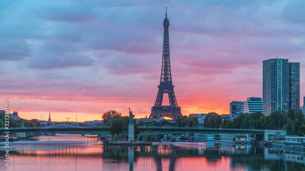 Eiffel Tower sunrise timelapse with boats on Seine river and in Paris, France.