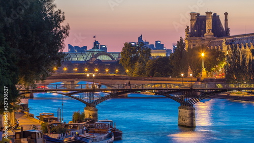 View on Pont des Arts in Paris after sunset day to night timelapse, France photo