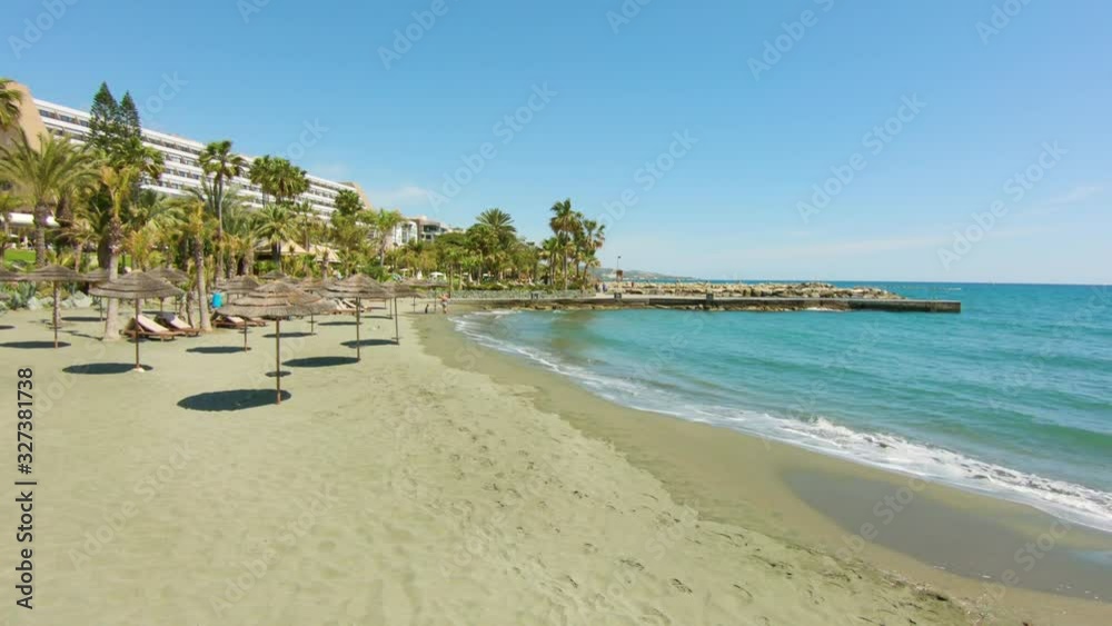 Luxury resort on the beach. Sun lounger and beach umbrellas. Beautiful sea, palm trees and sand. Luxury resort on the beach. Sun lounger and beach umbrellas. Beautiful sea, palm trees and sand.