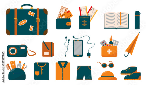 Suitcase and necessary things for holiday.