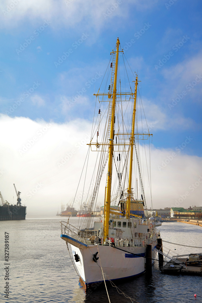 Bigsize panoramic view of sailboat with an icebreaker and submarine on a foggy spring warm day in April