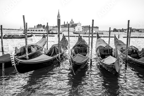 Gondolas by Saint Mark square with San Giorgio di Maggiore church, Venice © k_samurkas