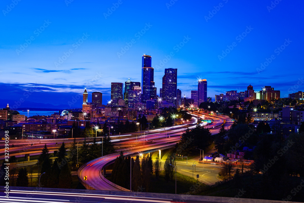 View of Seattle downtown over I5 interstate highway at night from Dr. Jose Rizal Park, Washington, USA