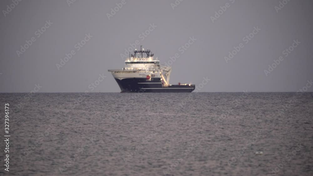 One ship standing offshore, in the open sea, ocean, summer. Limassol, Cyprus, 4K One ship standing offshore, in the open sea, ocean, summer. Limassol, Cyprus, 4K
