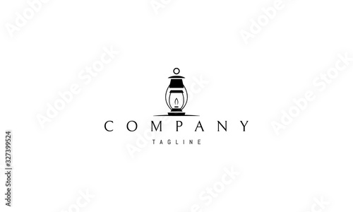 Vector black logo on which an abstract image of an oil lamp.