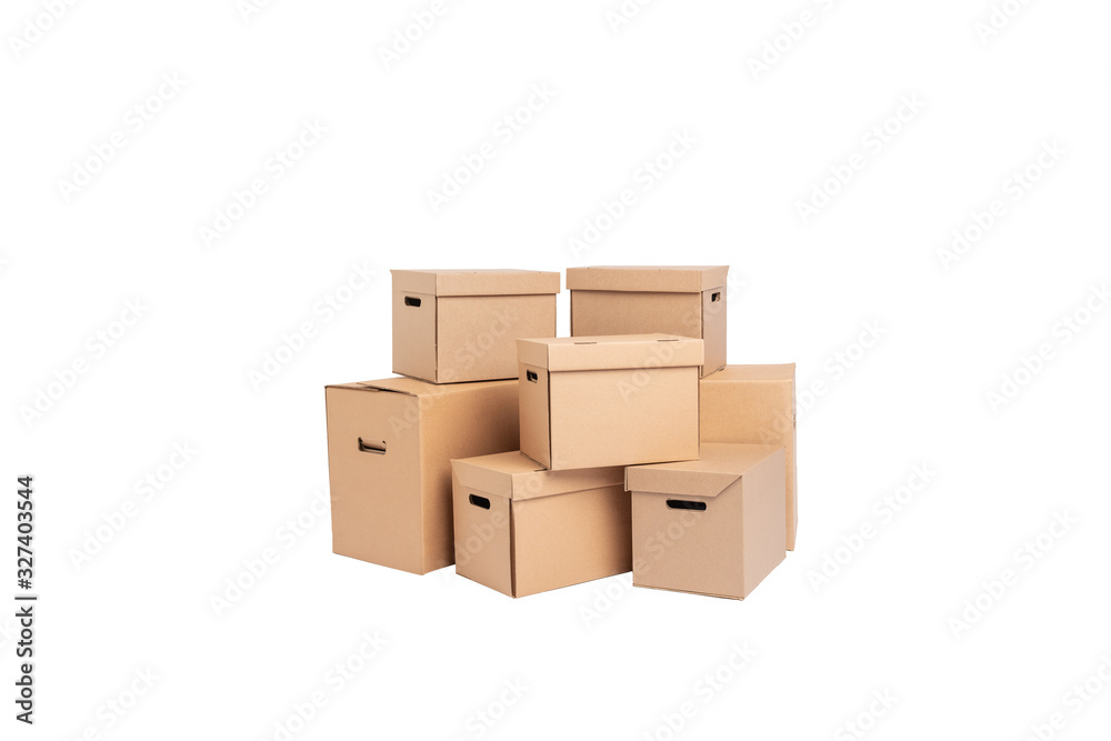 Stack of empty cardboard boxes isolated on white background closeup. Stack of empty cardboard boxes isolated on white background closeup.