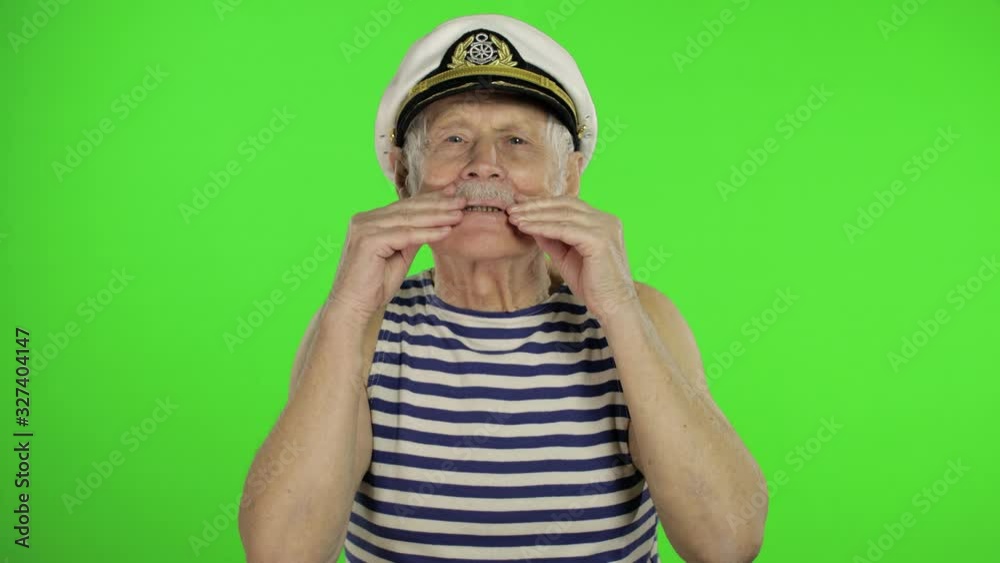 Elderly sailor man with mustache. Old sailorman on chroma key background Elderly sailor man with mustache. Old sailorman on chroma key background