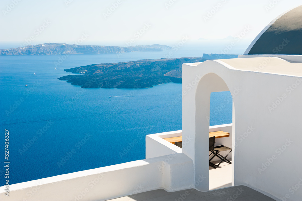 White architecture on Santorini island, Greece. Beautiful terrace with sea view. Travel destinations concept