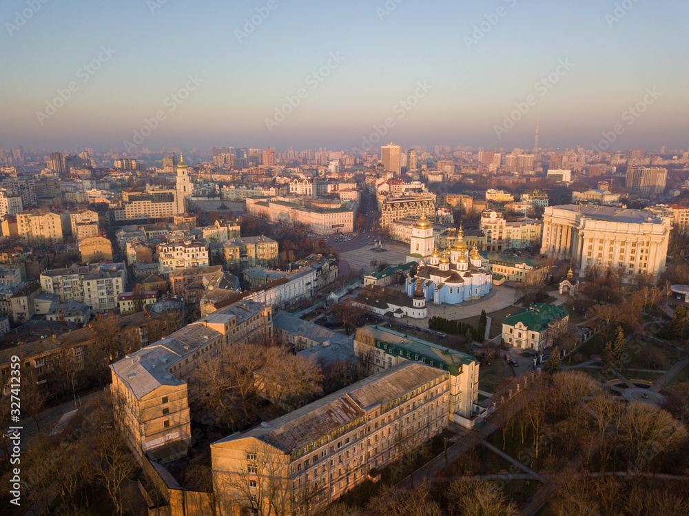 Aerial drone view. View of the Podil district in Kiev in the early morning.