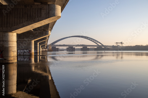 View across the Dnieper River to the bridge under construction. Near the Havana bridge in Kiev photo