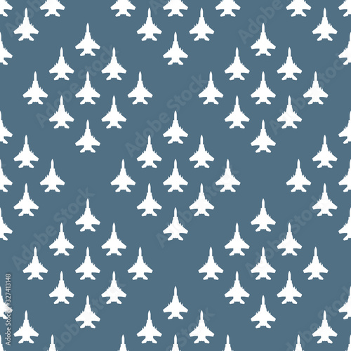 seamless pattern with silhouettes of fighter aircraft