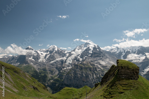 swiss mountain landscape with blue sky