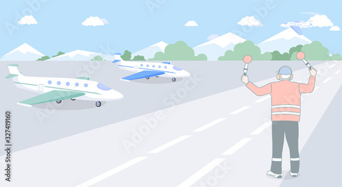Airport employee standing on runway with airplanes and signaling. Professional, air traffic controller.