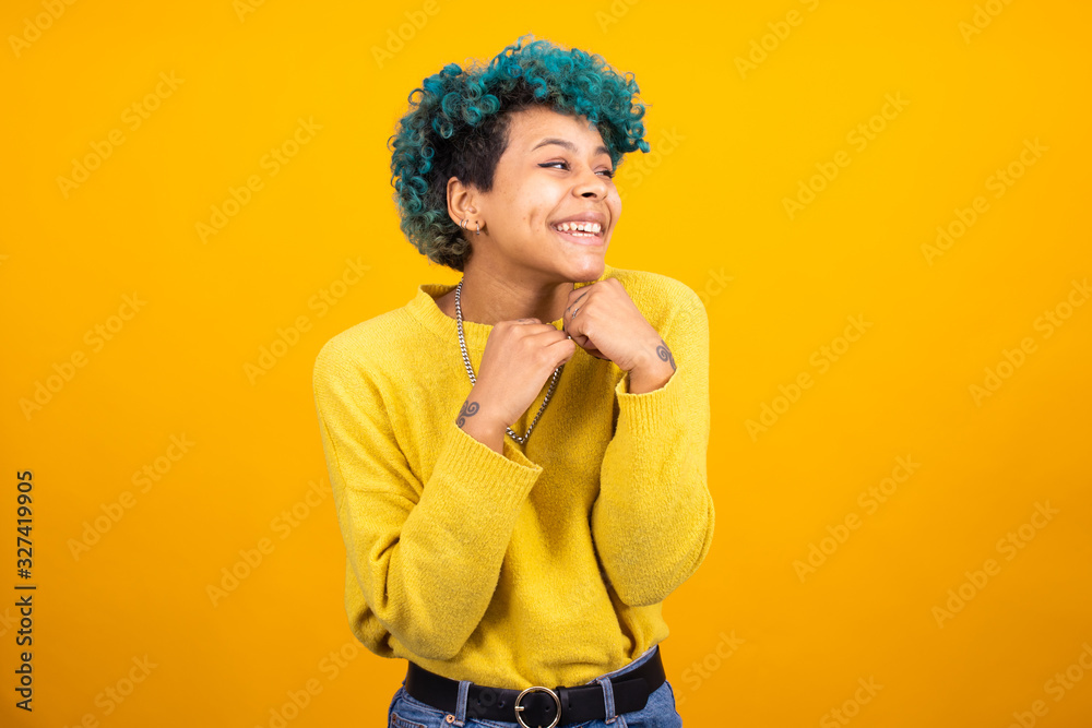 young african american girl or woman isolated on color background young african american girl or woman isolated on color background