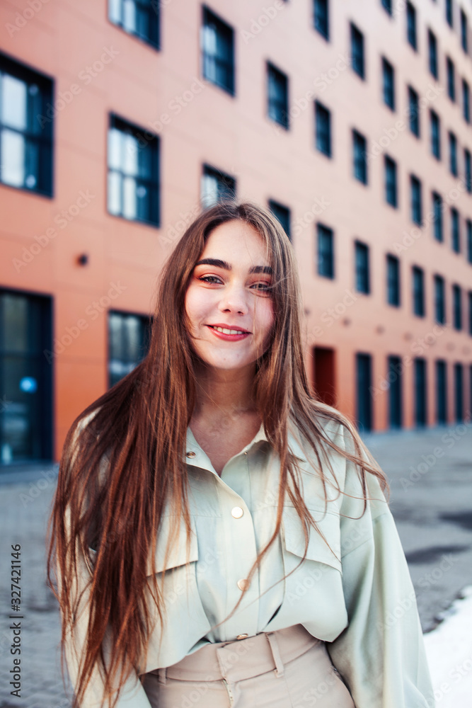 young pretty teenage girl posing cheerful happy smiling wearing street style outside in europe city, lifestyle people concept young pretty teenage girl posing cheerful happy smiling wearing street style outside in europe city, lifestyle people concept